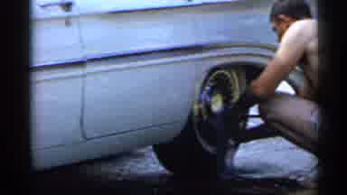 Florida (1958): Filling Car Tire And Cleaning Hubcap Followed By Driving On Road