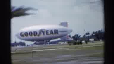 FLORIDA-1958: Goodyear Blimp and Classic Cars on a 1950s Street