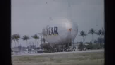 Florida (1958): Goodyear Blimp Is Irked In Field Surrounded By Palm Trees One