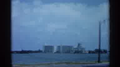 Florida (1958): Someone Driving Alongside Waterfront Looking Cross At Tall