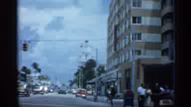 Florida (1958): Vehicle Travels Down City Street Buildings Alongside Rod Nineteen