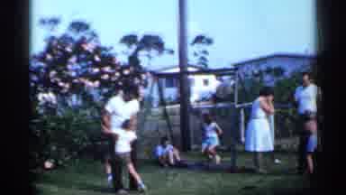 Florida (1958): Kids Playing On Playground As Parents Watch And Talk With Each