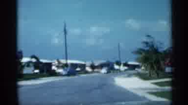 Florida (1958): Car That Is Driving Through Nice Suburb Neighborhood With Kids