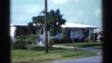 Florida (1958): Person Filming Row Of Houses While He Is In Car