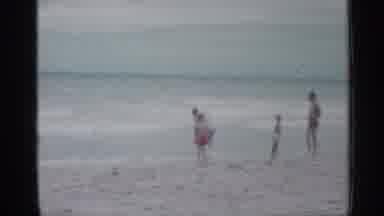 Florida (1958): Father And Kids Enjoying Beach Side And Playing Are Mes With Fun