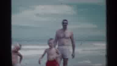 Florida (1958): Man And Two Boys In Swim Cl's Standing On Beach During Day