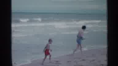 Florida (1958): Kids Playing By Earshot In Beach Collecting Things