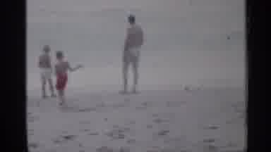 Florida (1958): Man And Two Young Boys Play At Earshot With Ocean Tide