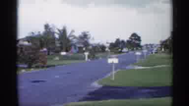 Florida (1958): Driveways In Neighborhood On Sunny Day With Green Grass