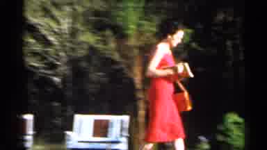 Florida (1958): Gardner Follows Woman In Red Dress Carrying Book