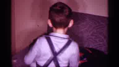New Jersey (1958): Child Dusting His Father Like Makeup
