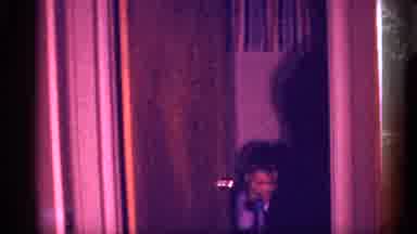 New Jersey (1958): Woman Walking Out Of Room S She Fixes Her Sir While Holding