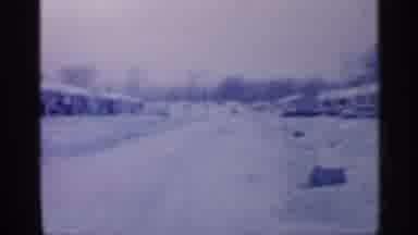 New Jersey (1958): Snow Covered Homes With Person Zing Through Window Of Brick