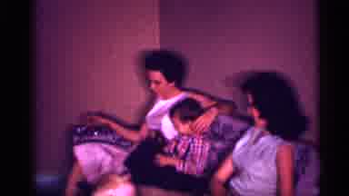 New Jersey (1958): Adults And Children In Living Room Sitting On Couch Kid Walks