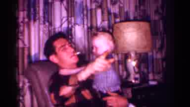 New Jersey (1958): Baby And Father Sitting Together On A Armchair In Air Living