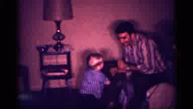 New Jersey (1958): Man Wearing Tn Striped Shirt Plays With Toddler Wearing Blue