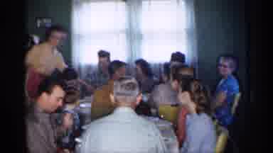 New Jersey (1958): Large Family Prepares Father Mel While Mir Brings Items To