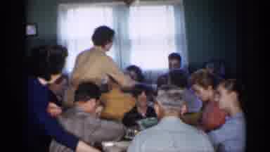 New Jersey (1958): People Sitter At Tables Dishing Food Out And Passing Food Long