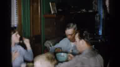New Jersey (1958): Big Family With Three Generations Sitting Round Dining Table