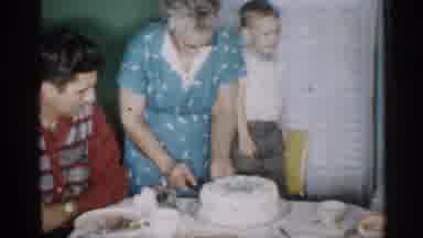 New Jersey (1958): Woman Cutting Into Cake S Child Stands On Chair With