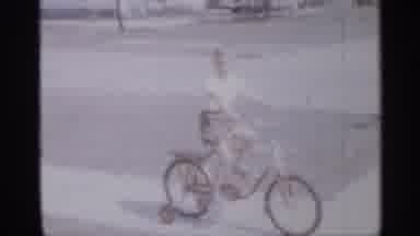 New Jersey (1958): Weatherboarding Of Man Dancing And A Child Prepare On Bicycle