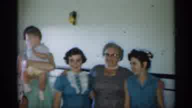 New Jersey (1958): Five Women Pose With A Infant While Man Gets By's Attention