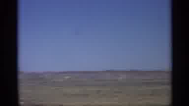 Arizona (1959): Horizontal And Long Straight Rod With White Car In Distance
