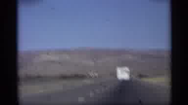 Arizona (1959): S Vehicle Travels Down Highway Comer Motherless Round Showing Blue