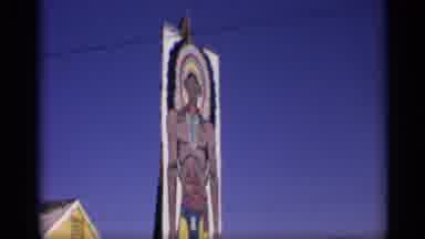 Arizona (1959): Int Sign With A Indian On It Next To Gift Shop With Yellow