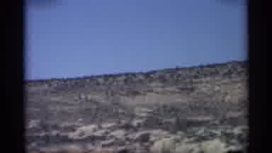 Arizona (1959): Long Strip Of Desert Being Filmed Father On Moving Car During Day