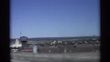 Arizona (1959): Driving Down Highway In Desert On Sunny Day