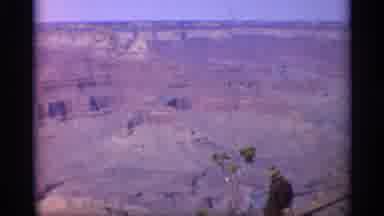 Arizona (1959): Two People With Child Sand Beside Railing Overlooking Grand Canyon