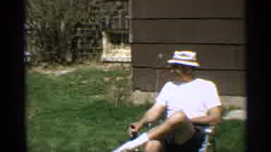 Arizona (1959): Man In White Shirt And White Ht Hanging Outside