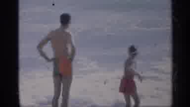 California (1959): Older Man And Woman Watching Two Young Boys Shirtless Small One