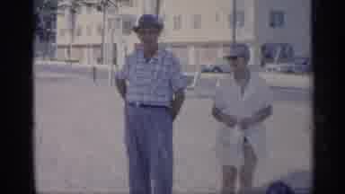 California (1959): Couple On Beach In Tropical Environment On Windy Sunny Day