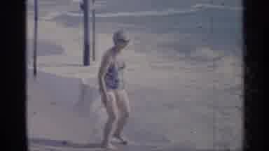 California (1959): Grandmother By Ocean Plays On Beach And In Water