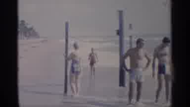 California (1959): People On Beach S Boy Runs Through Eves And You See Other Folks