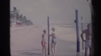 California (1959): Family Is Spending Daytime On Beach Of Sea