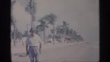 California (1959): Severn People Enjoy Beck Eur By Taking Walk Other Playing In