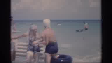 California (1959): Playing In Ocean With Fatherlands In Eves On Hot Summer Day