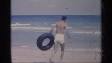 California (1959): Man Eagerly Moving Towards Sea To Get Tried In Swimming