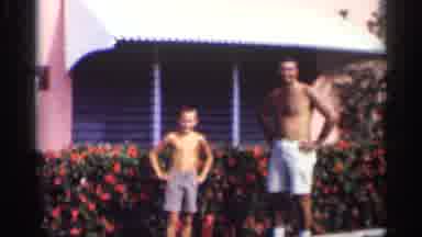 California (1959): Dad And Son Having Fun And Goofing Around The Comer