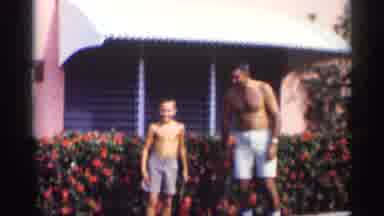 California (1959): Man And Boy With Air Shirts Of Wiving At Comer In Father Of