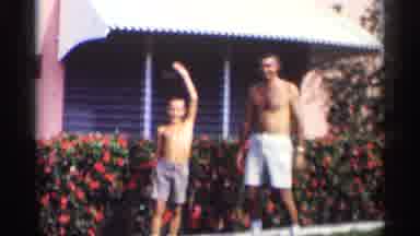 California (1959): Man And Boy Wearing Shooter Sand In Father Of Red Rose Bushes