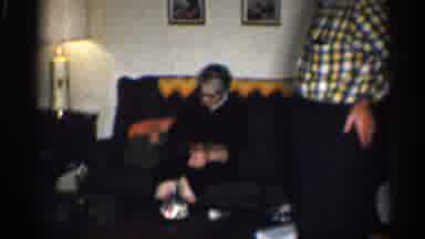 California (1959): Elder Man Stands And Elder Woman Sits On Couch And Y Talk And