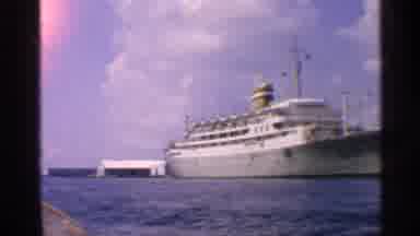California (1959): Large White Ship Sitting Still At Dock