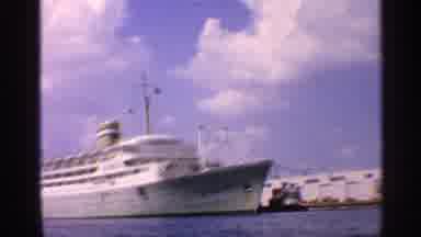 California (1959): White Ship In Water On Bright Sunny Day