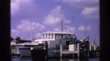 California (1959): Pr Of White Boys Docked On Bright Sunny Day