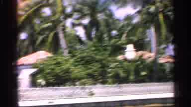 Florida (1959): Comer Hurries To Captures Blue Building But Is Shy And We Pass By