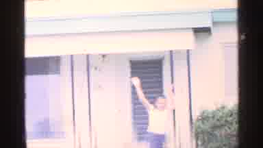 Florida (1959): Little Boy Standing Outside On His Pothers Waving At All Of Us